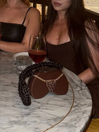 TheGstring Clutch